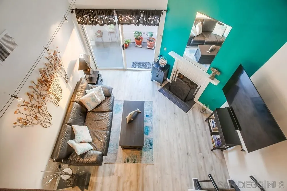 157 Mangano Circle Encinitas, CA 92024 - Photo 21 of 28 an aerial view of a house with wooden floor and a fireplace