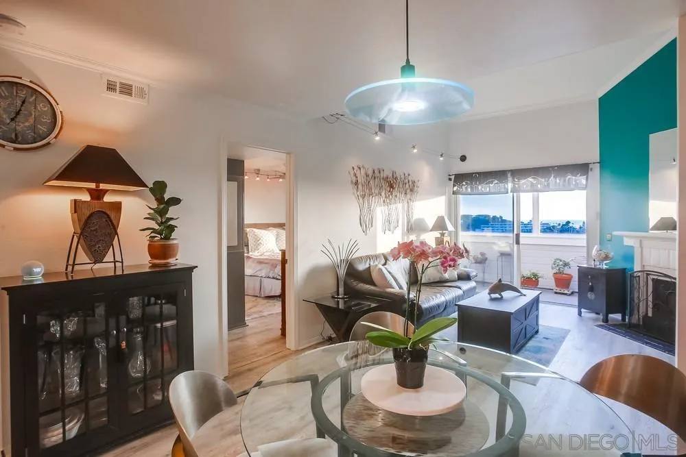 157 Mangano Circle Encinitas, CA 92024 - Photo 3 of 28 a living room with fireplace furniture and a large window