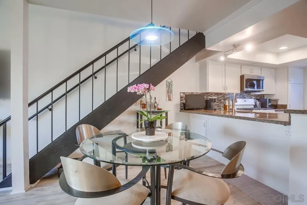 157 Mangano Circle Encinitas, CA 92024 - Photo 7 of 28 a dining room with furniture and wooden floor