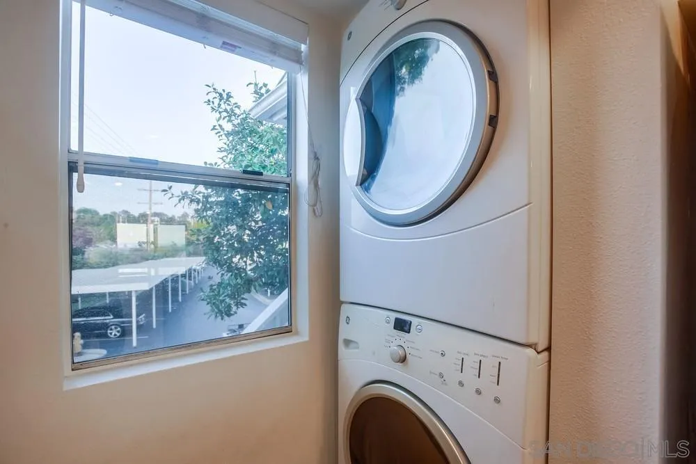 157 Mangano Circle Encinitas, CA 92024 - Photo 10 of 28 a close view of a utility room with dryer and washer