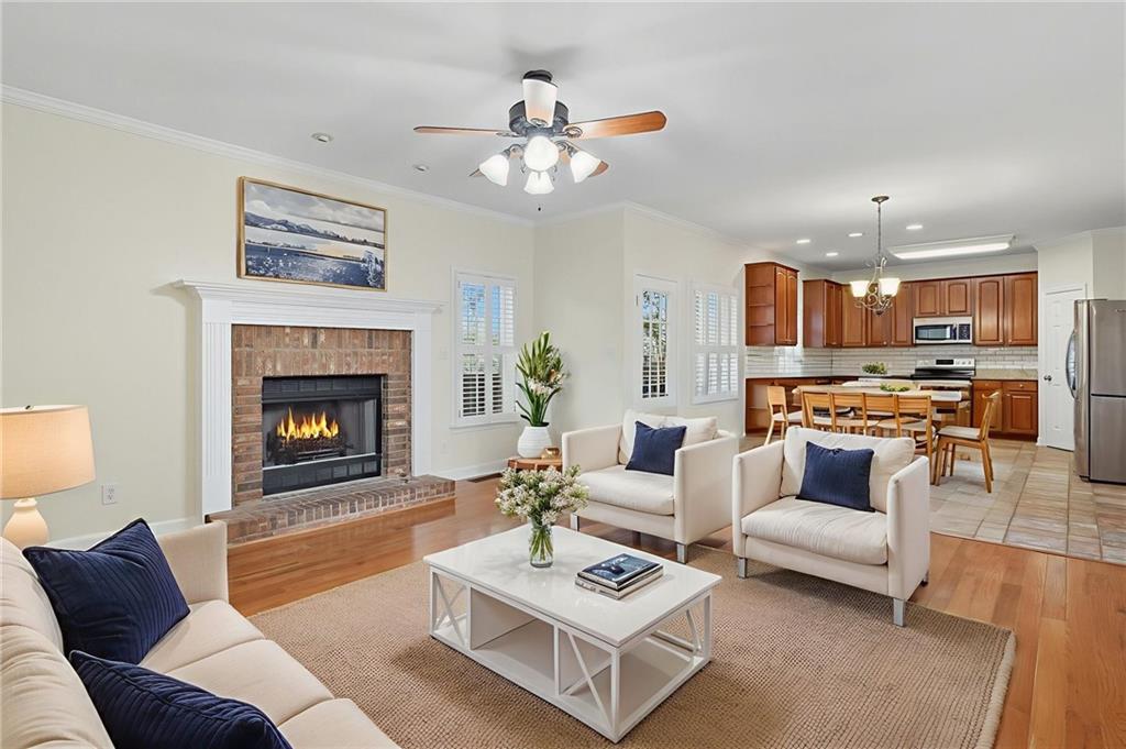 2301 Alexander Farms Court Southwest Marietta, GA 30064 - Photo 30 of 62 a living room with furniture and a fireplace