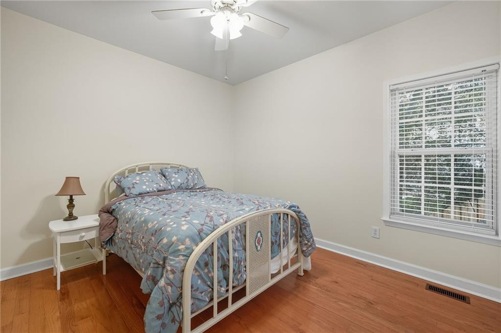 2301 Alexander Farms Court Southwest Marietta, GA 30064 - Photo 34 of 62 a bedroom with a bed and a window