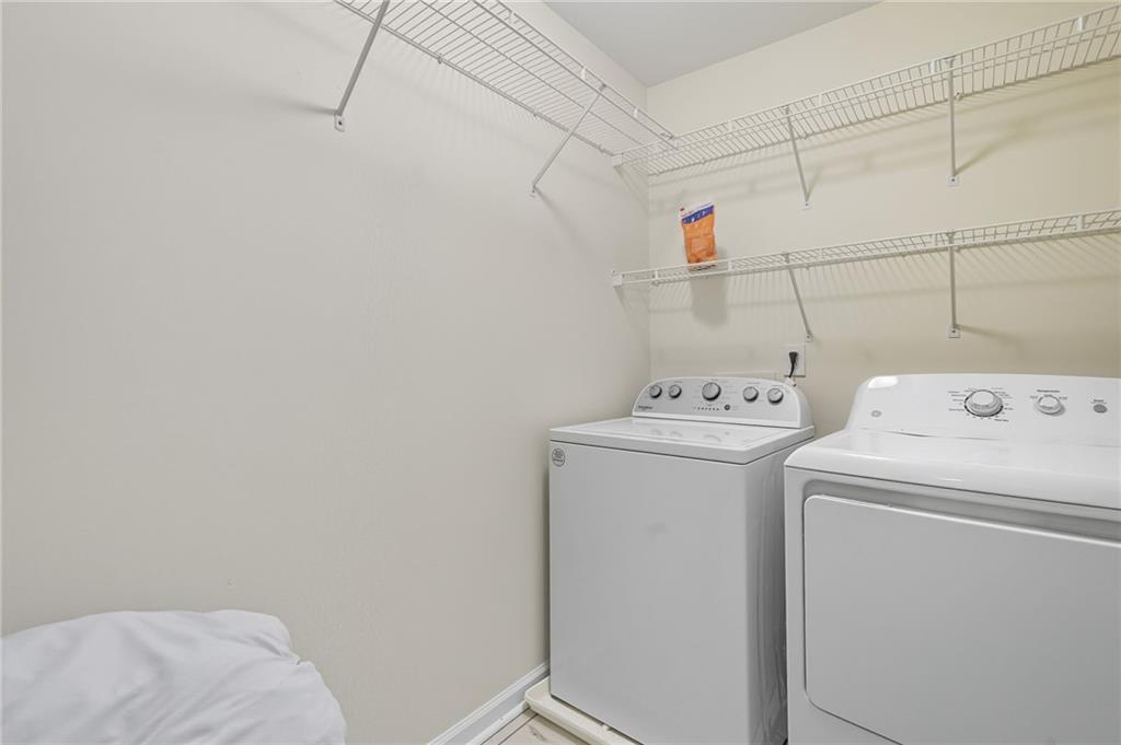 2301 Alexander Farms Court Southwest Marietta, GA 30064 - Photo 45 of 62 a utility room with dryer and washer