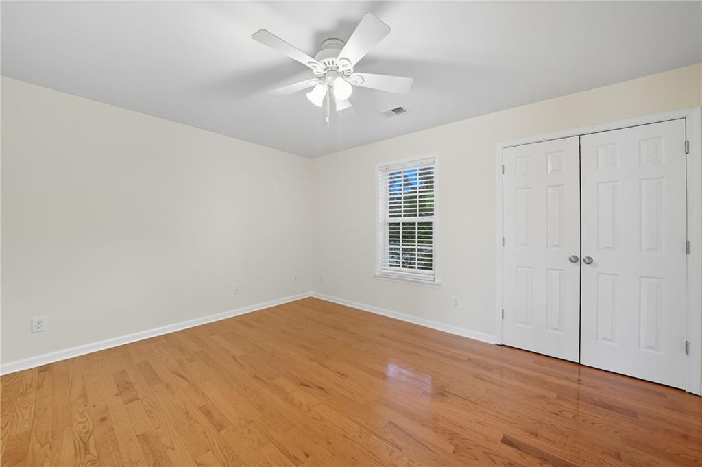 2301 Alexander Farms Court Southwest Marietta, GA 30064 - Photo 49 of 62 an empty room with windows and fan