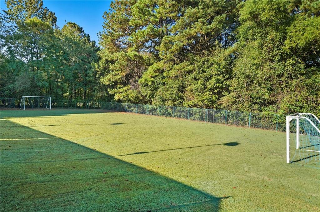 2301 Alexander Farms Court Southwest Marietta, GA 30064 - Photo 7 of 62 a view of a swimming pool with an outdoor space