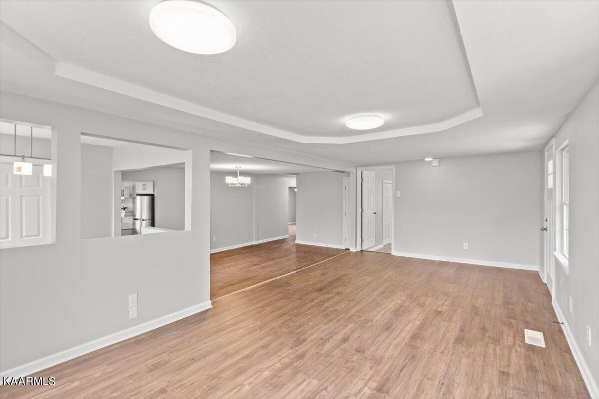 316 Granite Road Clinton, TN 37716 - Photo 7 of 26 a view of empty room with wooden floor