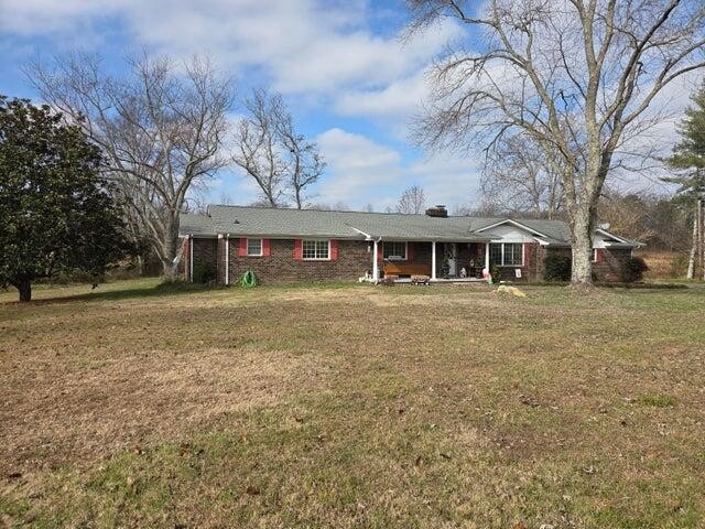 2596 Keith Valley Road Southeast Cleveland, TN 37323 - Photo 2 of 24 a front view of a house with a yard