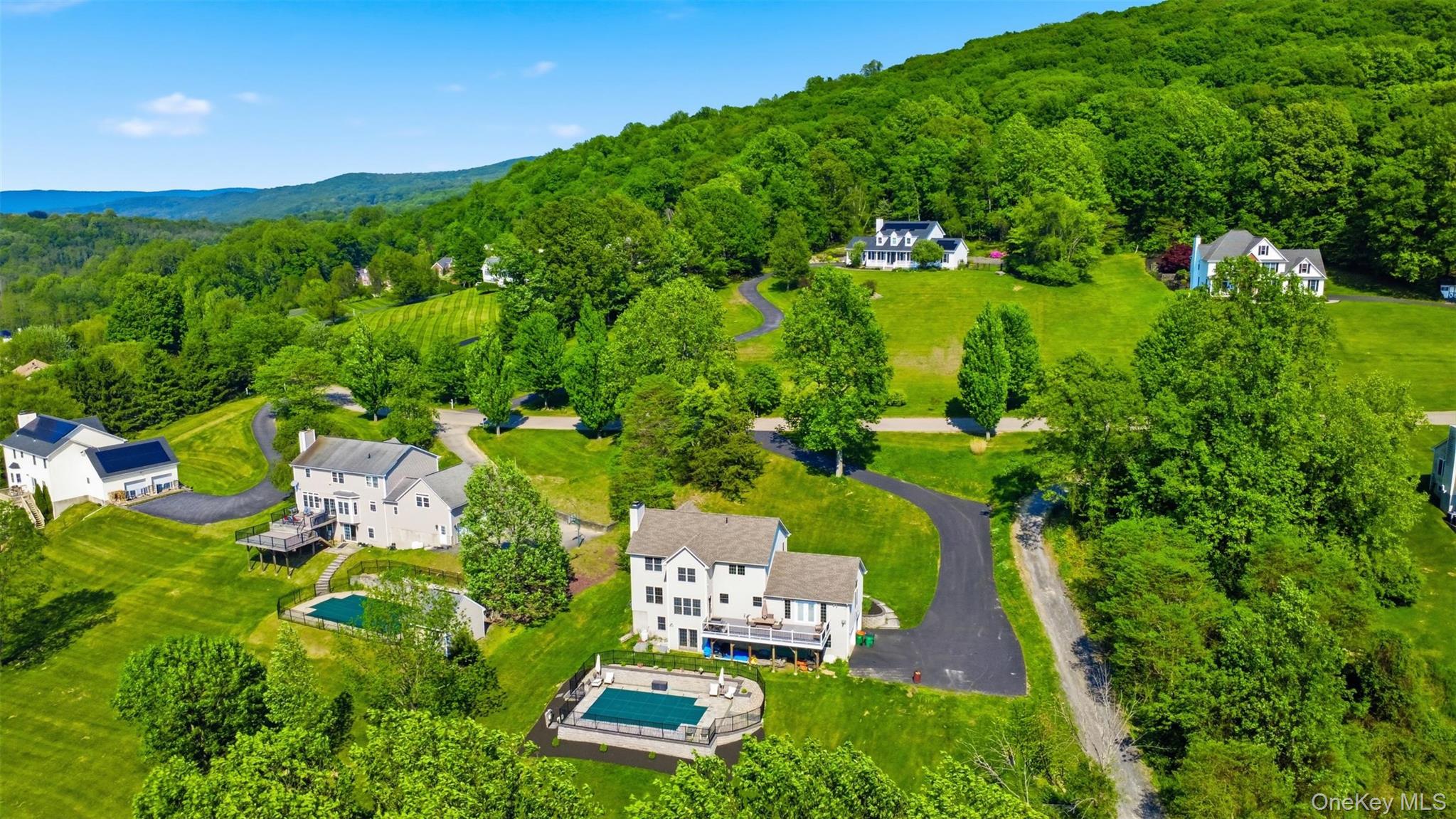 233 Devon Farms Road Stormville, NY 12582 - Photo 2 of 48 an aerial view of a house with a yard
