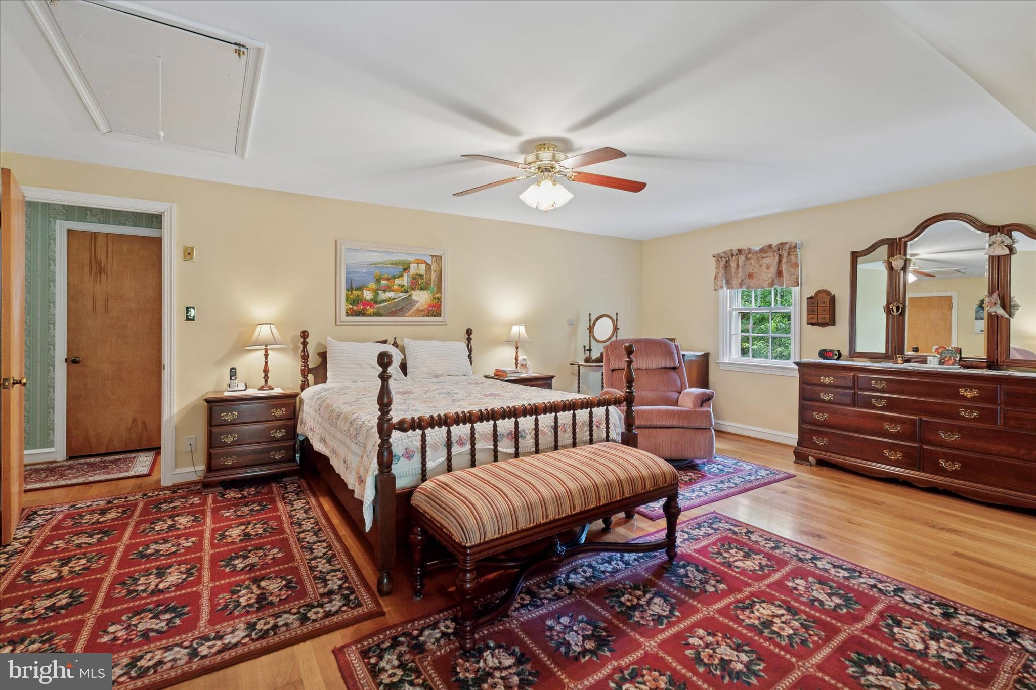 240 Rices Mill Road Wyncote, PA 19095 - Photo 21 of 36 a bed room with a bed and a chandelier