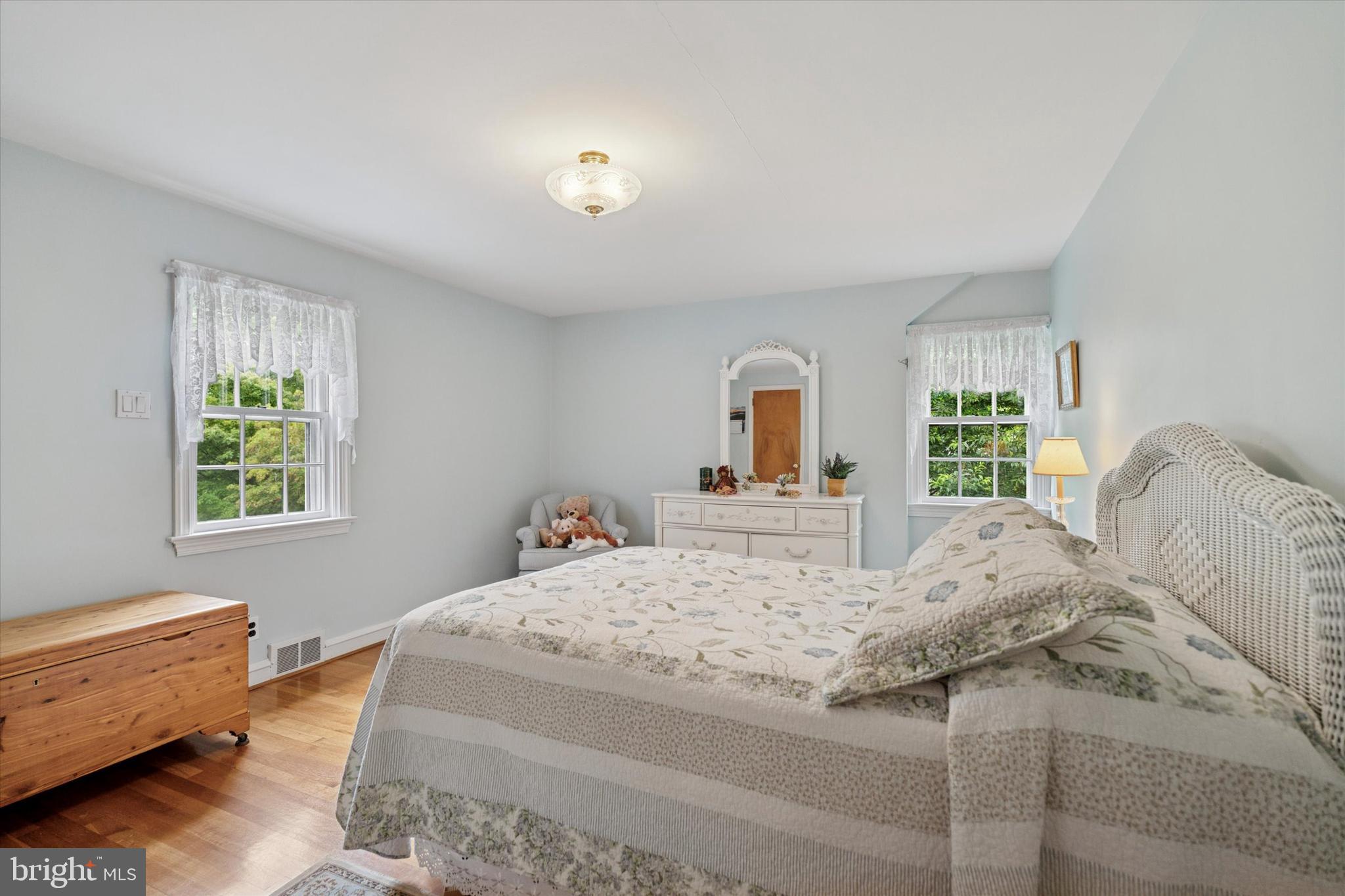 240 Rices Mill Road Wyncote, PA 19095 - Photo 23 of 36 a bedroom with a bed and a window