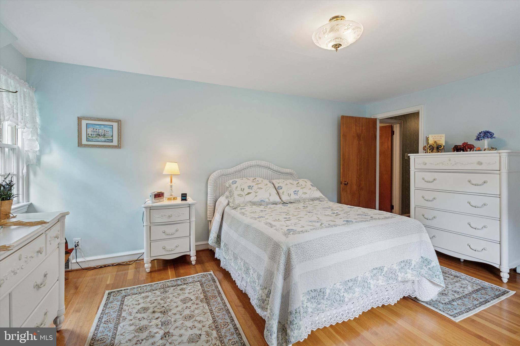 240 Rices Mill Road Wyncote, PA 19095 - Photo 24 of 36 a spacious bedroom with a bed and a dresser in it