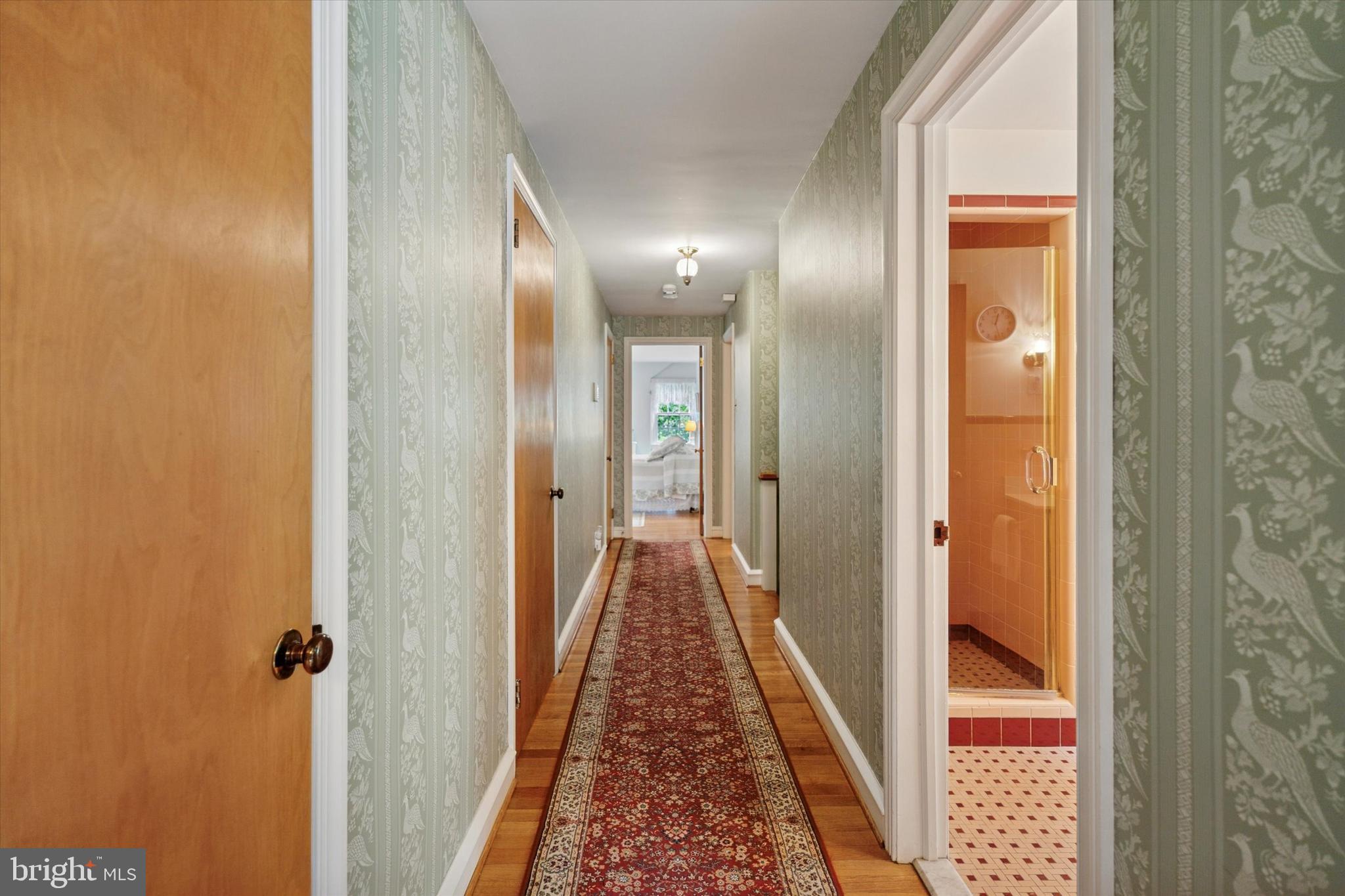 240 Rices Mill Road Wyncote, PA 19095 - Photo 27 of 36 a view of hallway with wooden floor