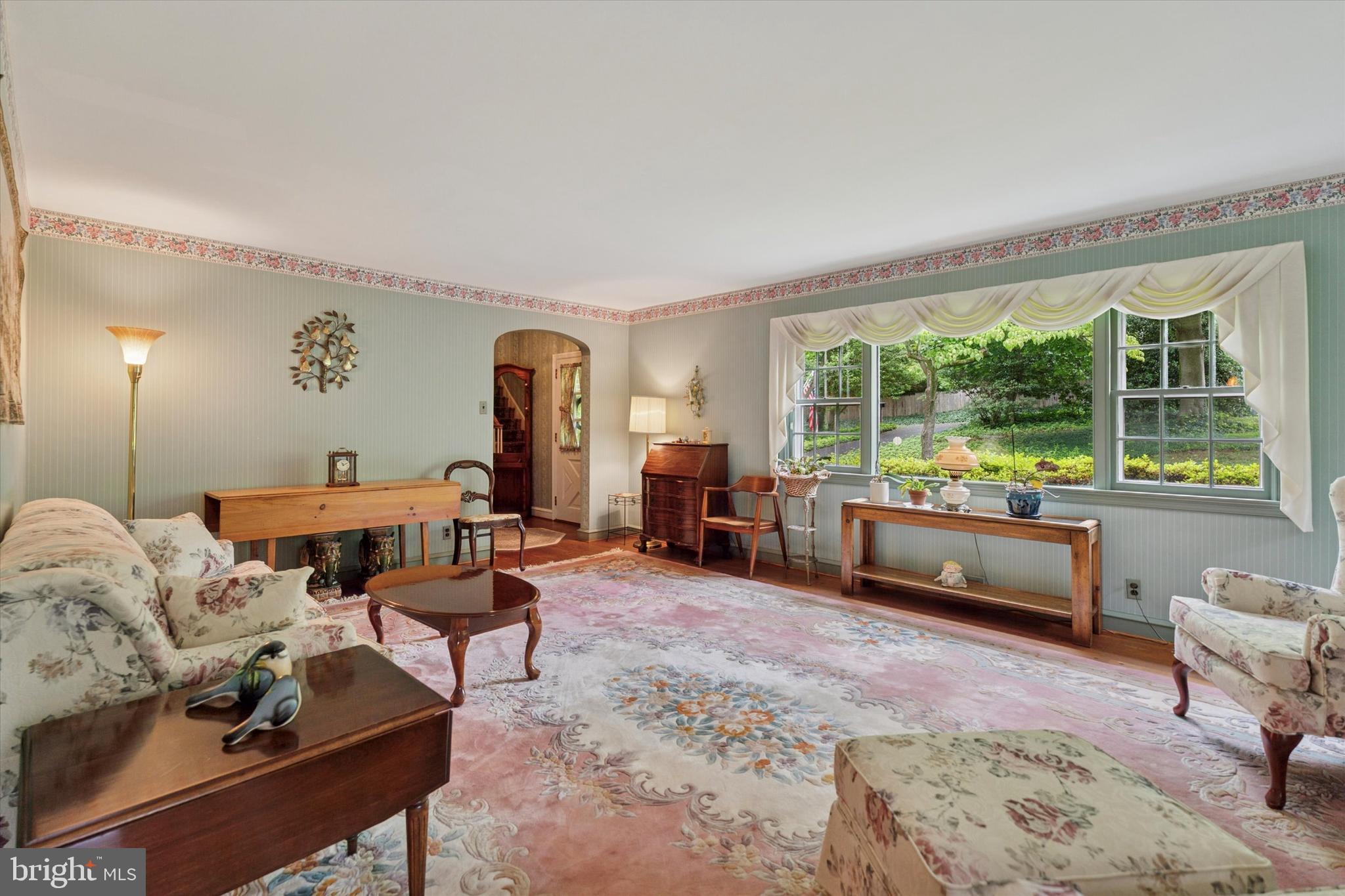 240 Rices Mill Road Wyncote, PA 19095 - Photo 4 of 36 a living room with furniture and a large window