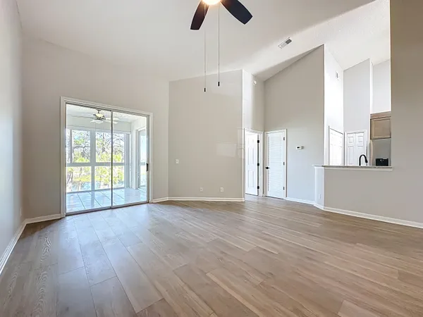 a view of an empty room with a window