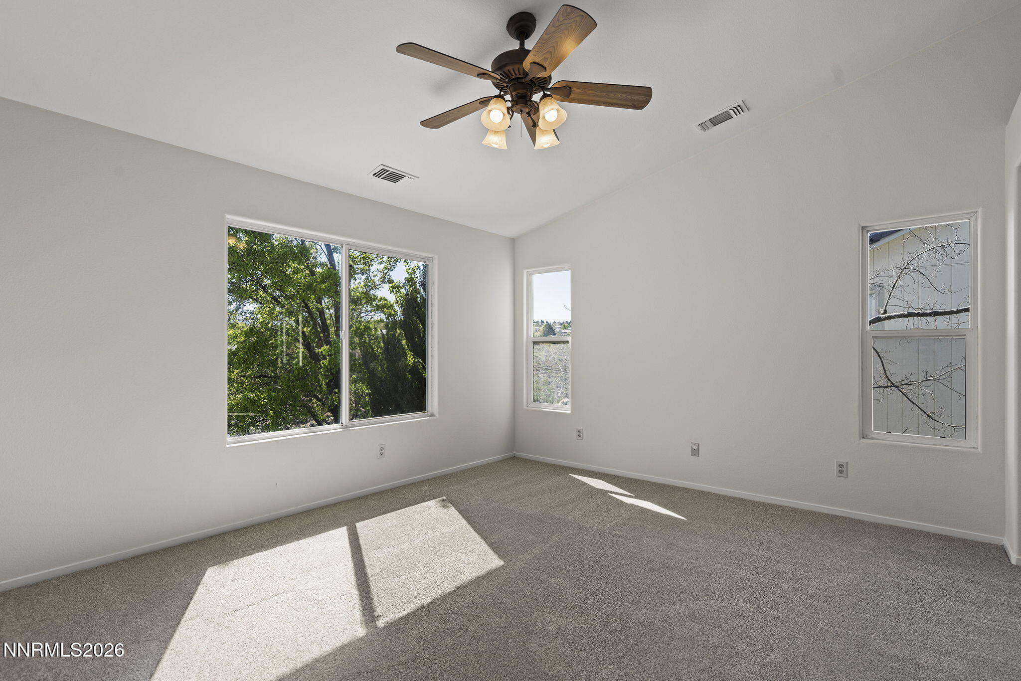 5490 Twin Creeks Drive Reno, NV 89523 - Photo 14 of 27 a view of an empty room with a window