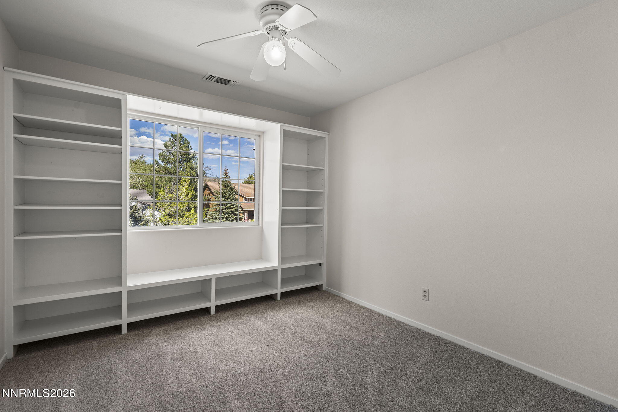 5490 Twin Creeks Drive Reno, NV 89523 - Photo 21 of 27 a view of room with window and ceiling fan