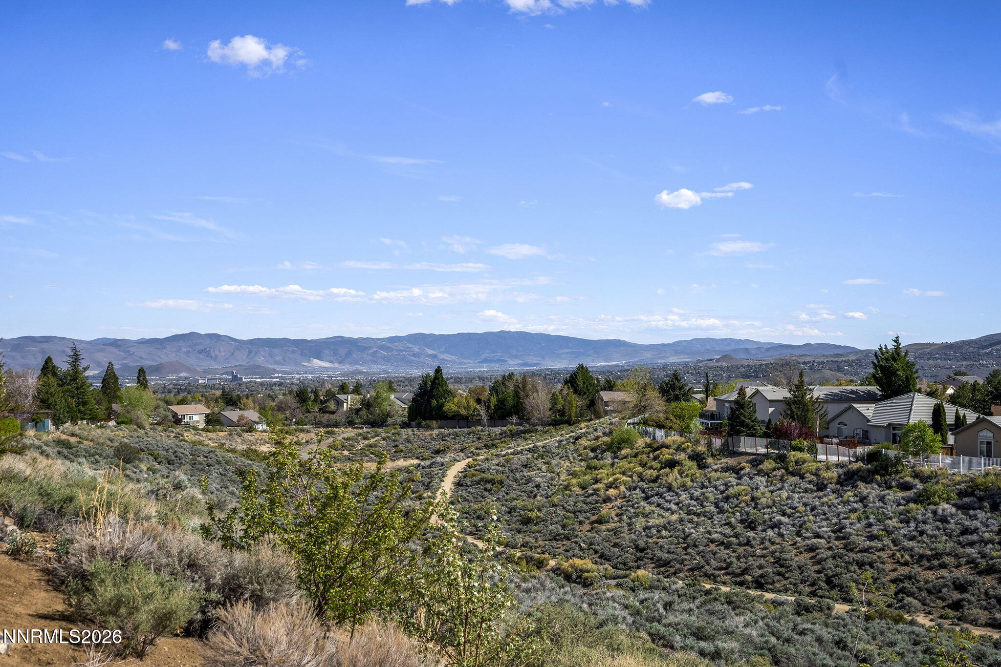 5490 Twin Creeks Drive Reno, NV 89523 - Photo 27 of 27 a view of a town with mountains in the background