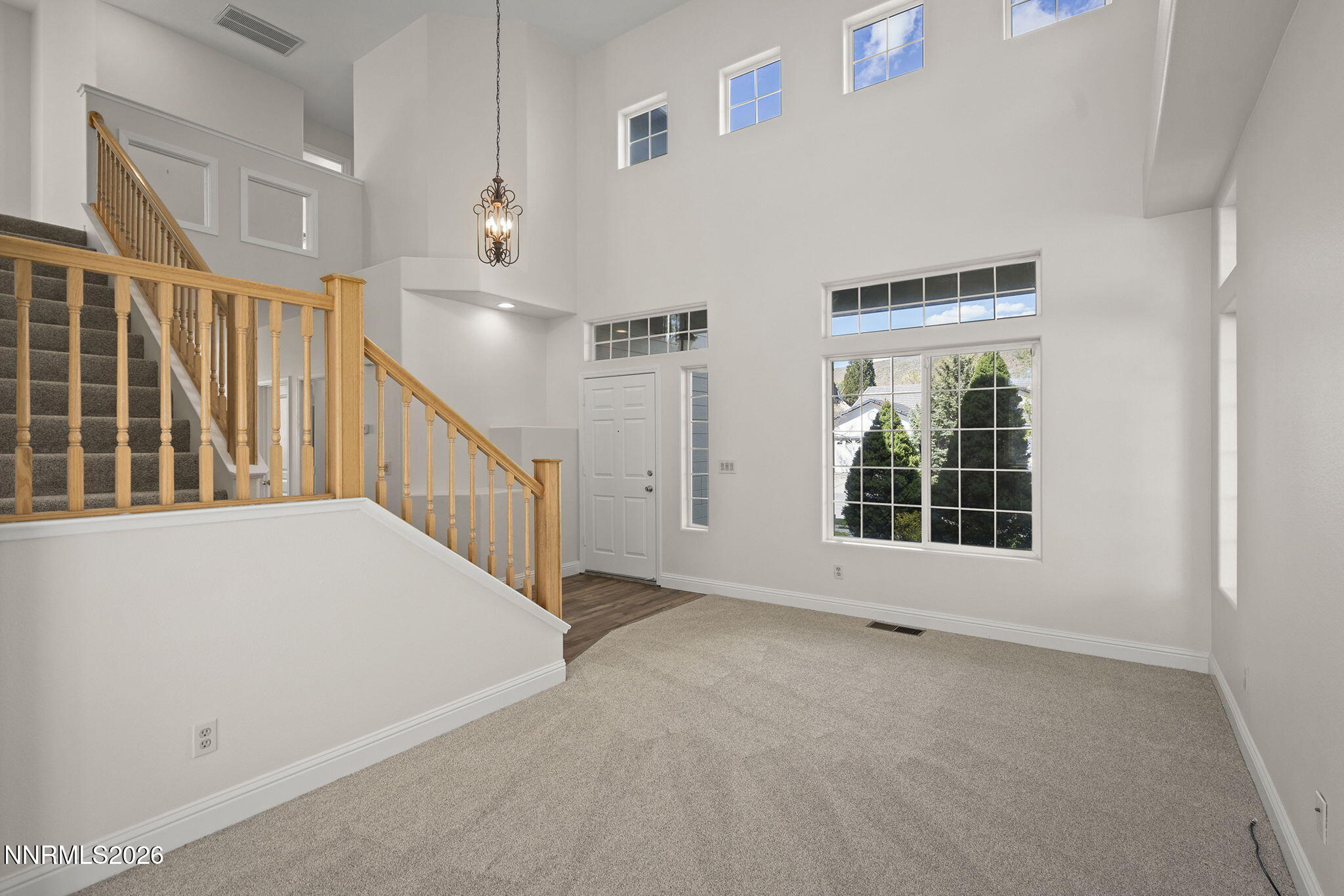 5490 Twin Creeks Drive Reno, NV 89523 - Photo 4 of 27 a view of an empty room with a window