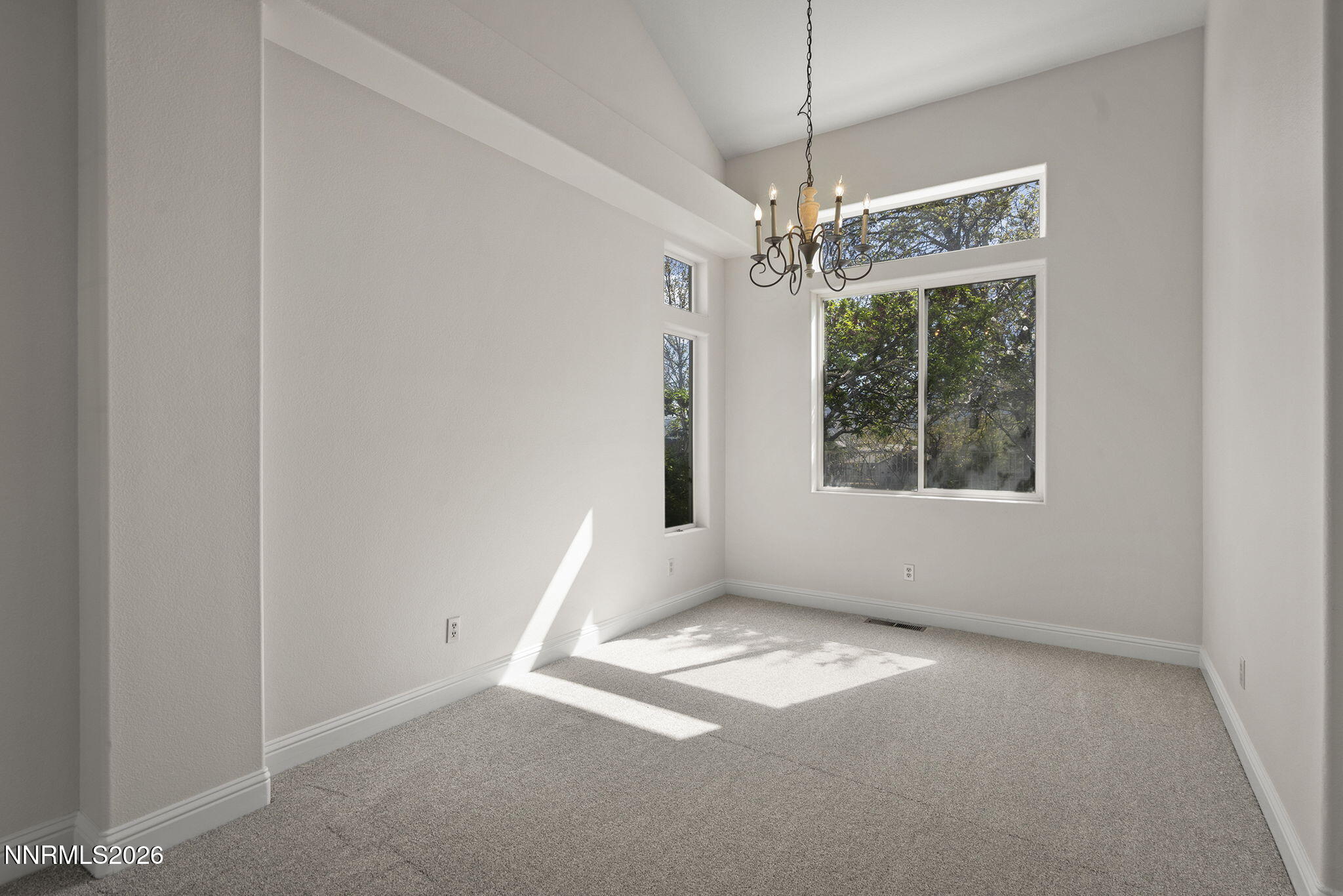 5490 Twin Creeks Drive Reno, NV 89523 - Photo 5 of 27 a view of an empty room with a window