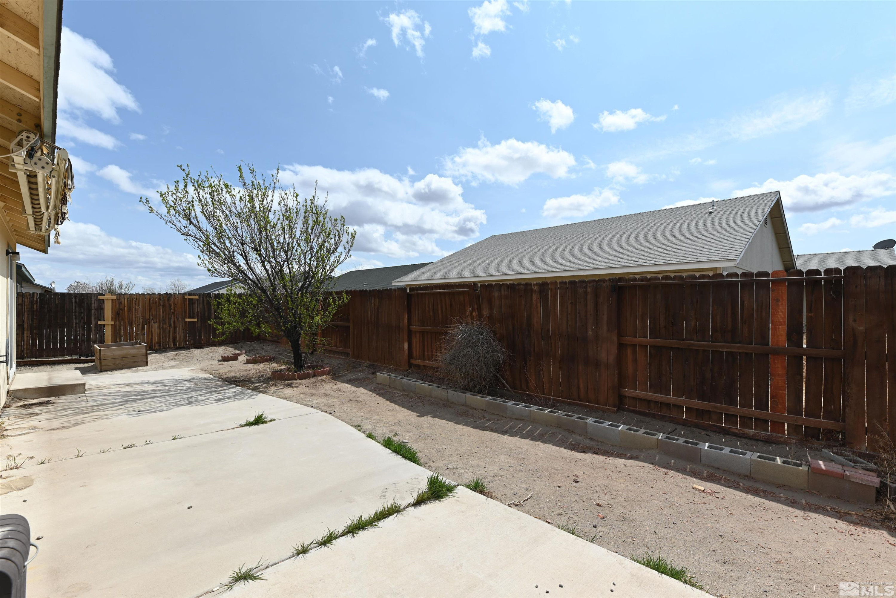 2129 Fort Bridger Road Fernley, NV 89408 - Photo 11 of 21 a backyard of a house