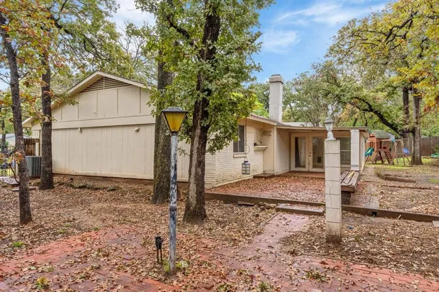 a view of a house with a sink and yard