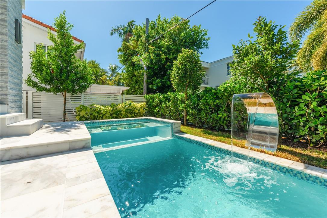 4610 Alton Road Miami Beach, FL 33140 - Photo 15 of 60 a view of swimming pool with a patio