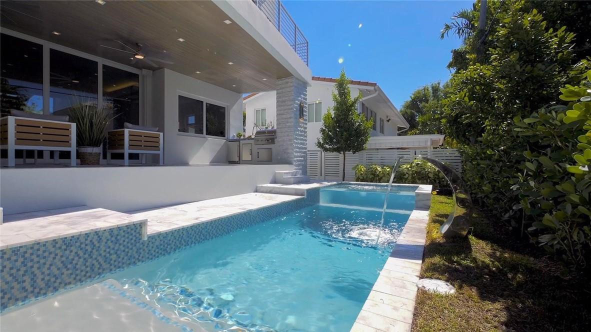 4610 Alton Road Miami Beach, FL 33140 - Photo 55 of 60 a view of house with outdoor space