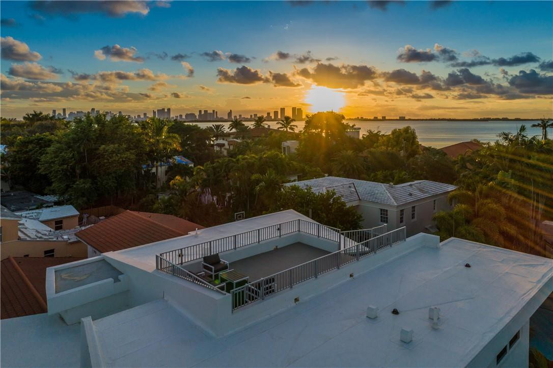 4610 Alton Road Miami Beach, FL 33140 - Photo 59 of 60 an aerial view of a house with a yard