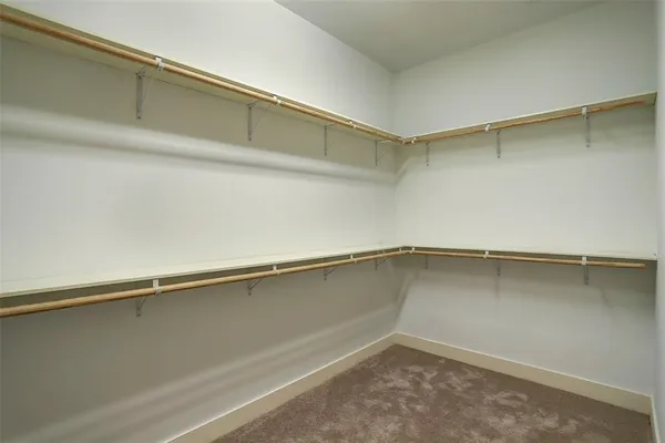 a view of a backyard with furniture and a tub