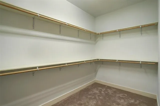 a view of a backyard with furniture and a tub