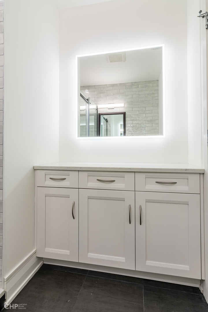 2318 West Thomas Street, Unit 3R Chicago, IL 60622 - Photo 11 of 12 a close view of stove and cabinets