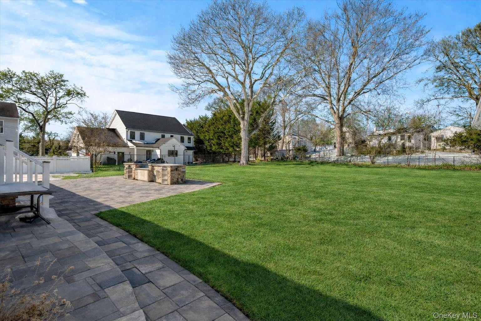 1150 Ruth Road Mattituck, NY 11952 - Photo 15 of 19 a view of a park with bench and trees