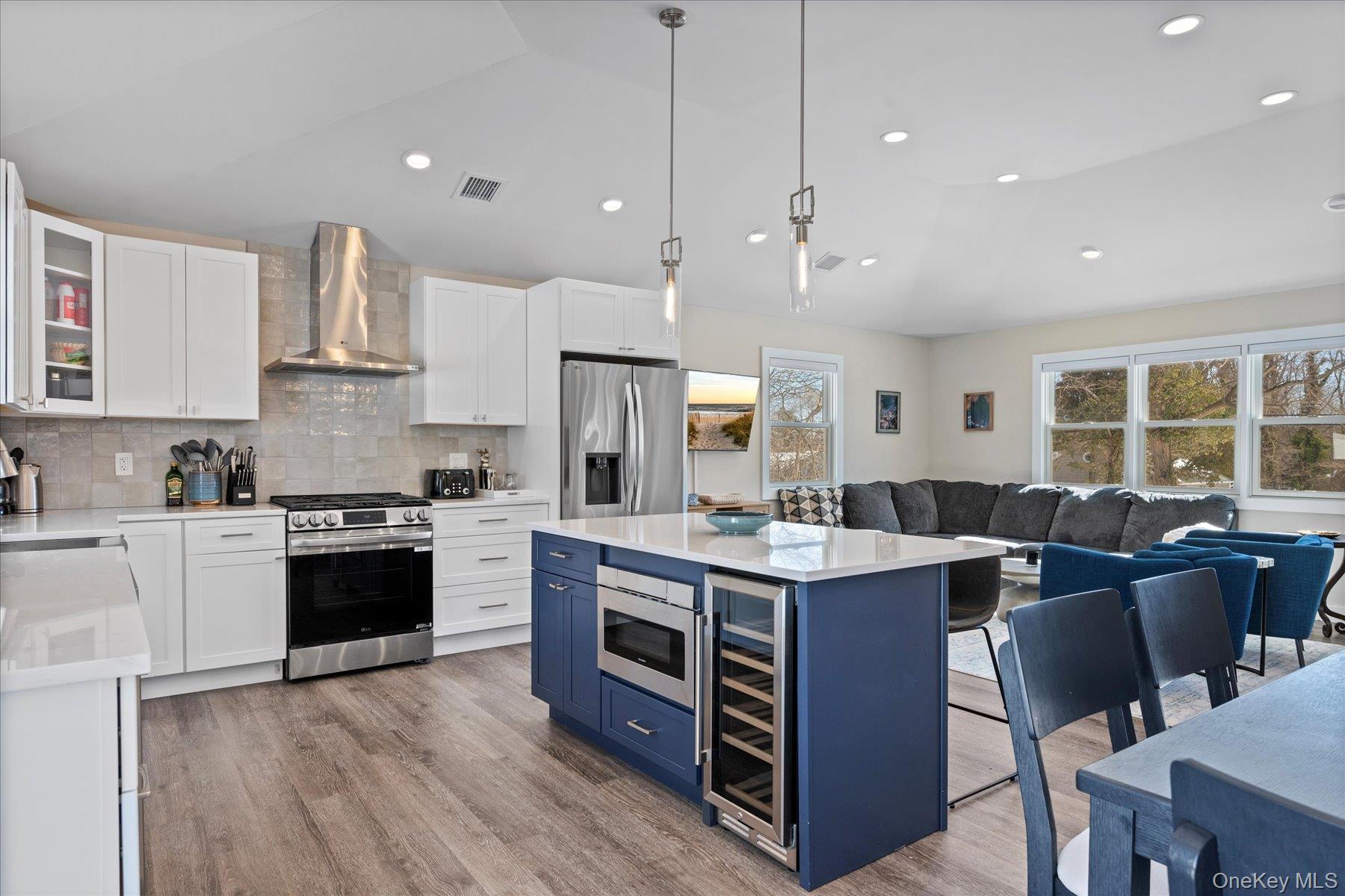 1150 Ruth Road Mattituck, NY 11952 - Photo 9 of 19 a open kitchen with stainless steel appliances granite countertop a stove and kitchen island