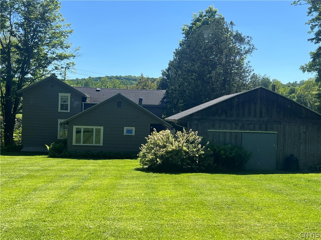 2778 Otisco Valley Road Marcellus, NY 13110 - Photo 7 of 44 View from the backyard of the house and garage wit