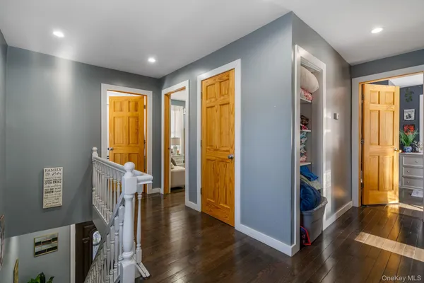 a view of livingroom with hardwood floor and a ceiling fan