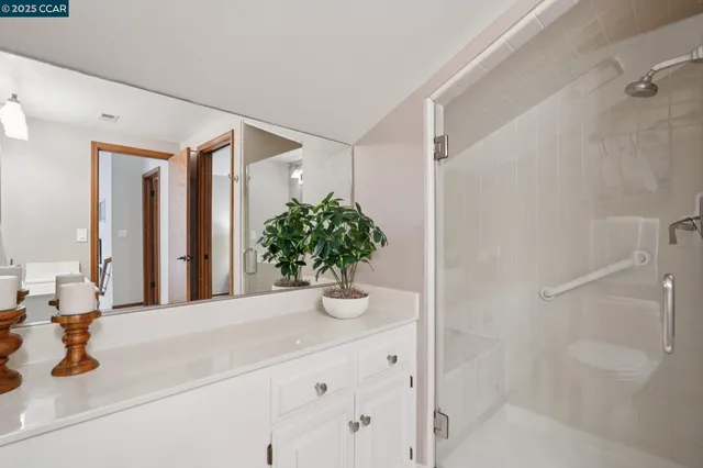 an aerial view of beach and residential houses with outdoor space