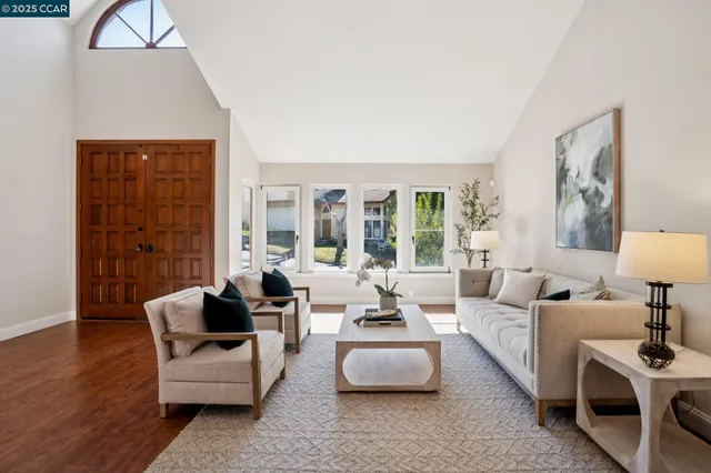 a living room with furniture and a couch