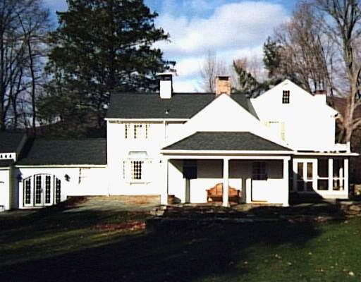 a front view of a house with yard