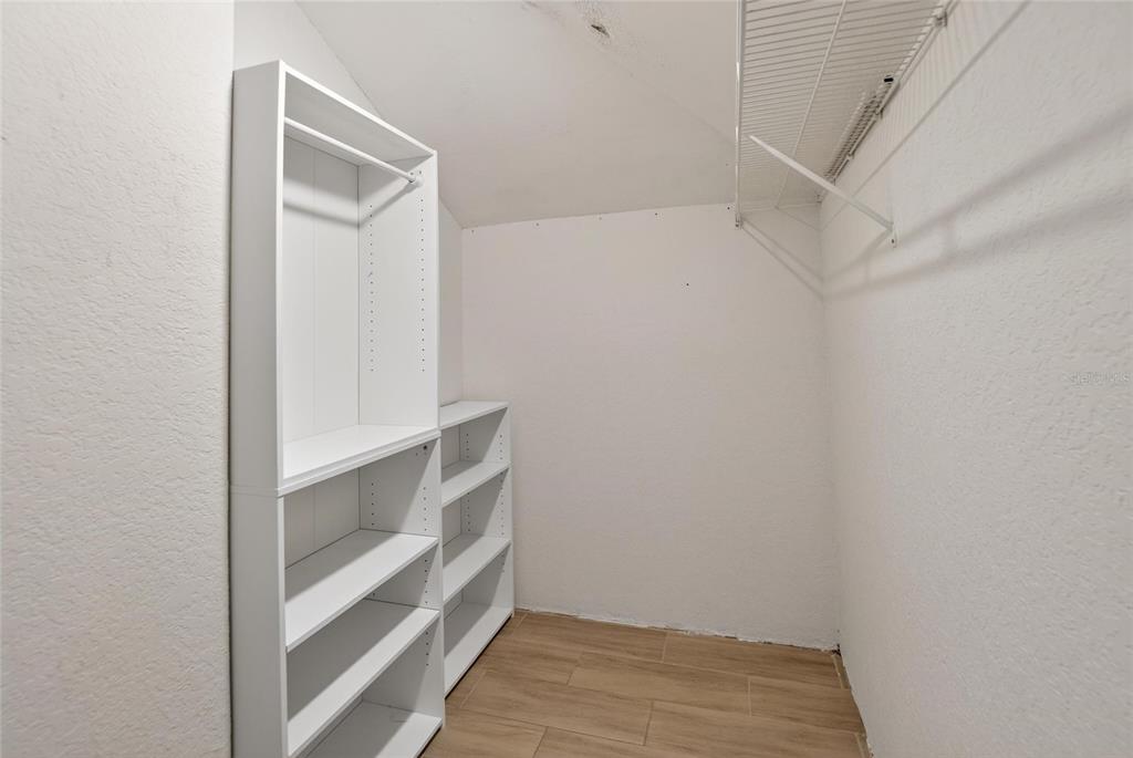 15047 Woodbury Road Brooksville, FL 34604 - Photo 30 of 98 a view of an empty walk in closet