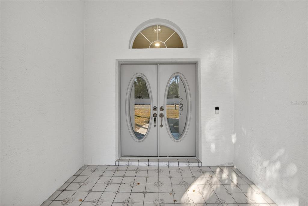 15047 Woodbury Road Brooksville, FL 34604 - Photo 6 of 98 a view of a door