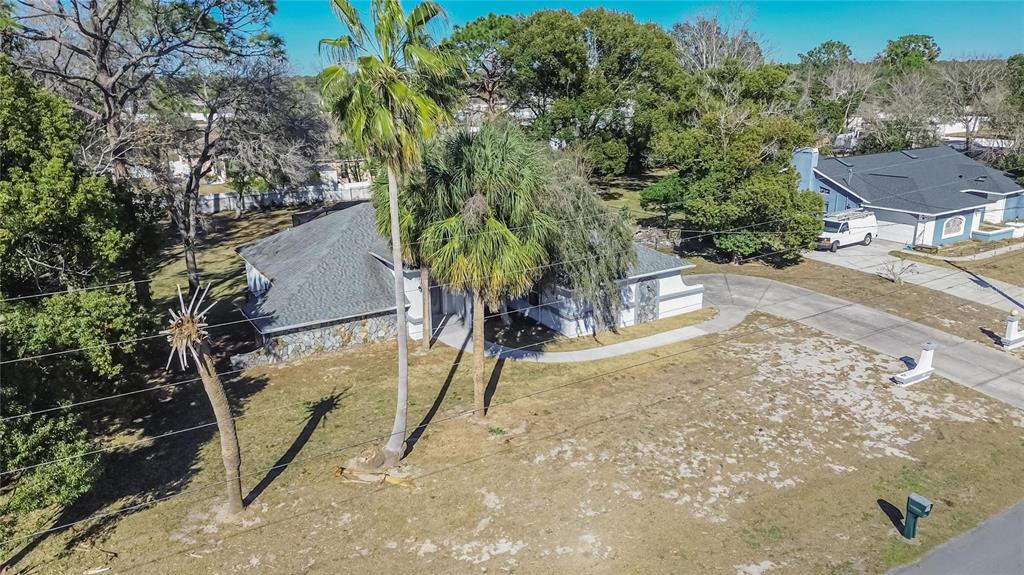 15047 Woodbury Road Brooksville, FL 34604 - Photo 76 of 98 a view of an outdoor space and a yard