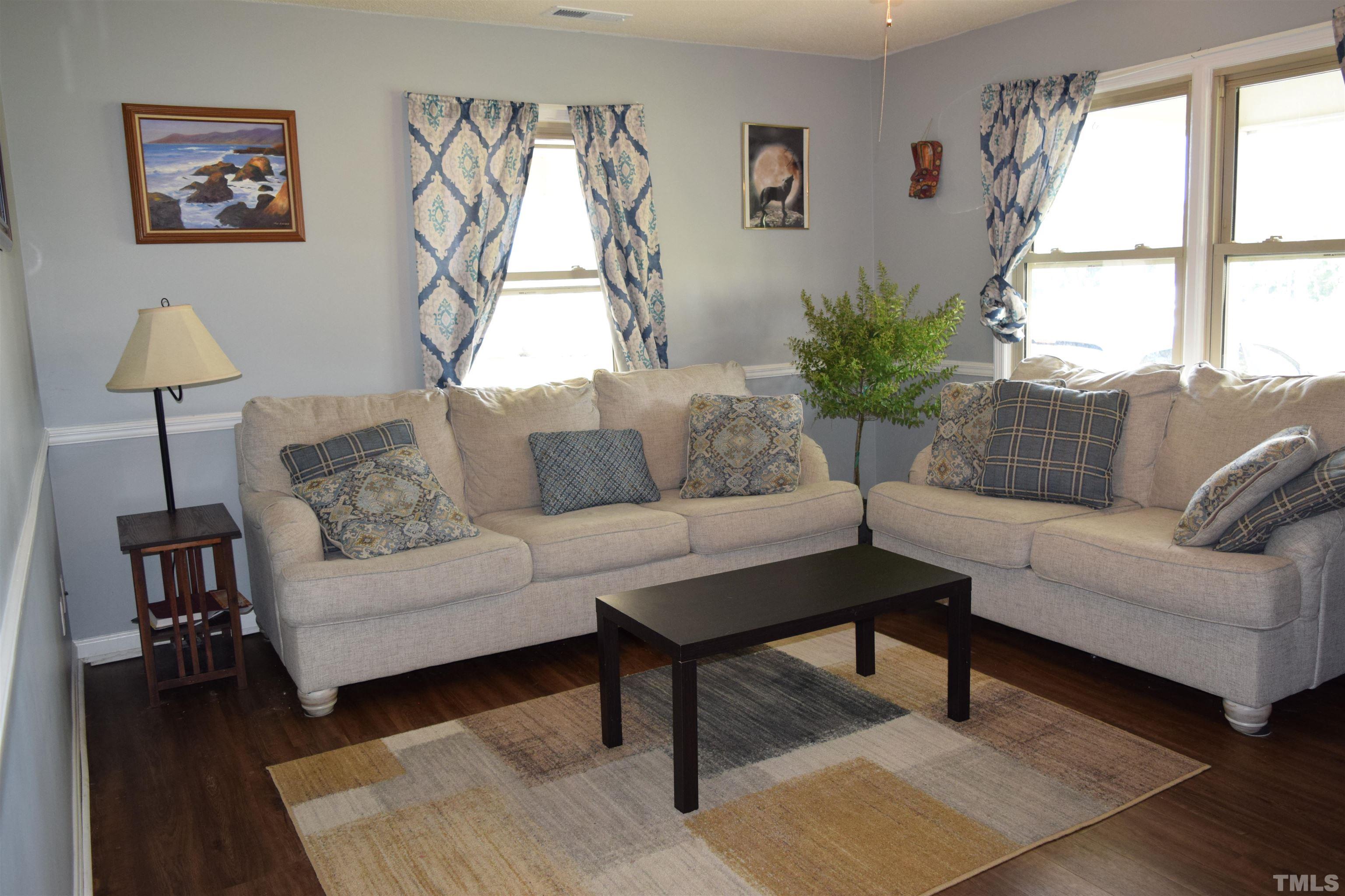 2451 Baileys Crossroads Road Coats, NC 27521 - Photo 3 of 13 a living room with furniture and a large window