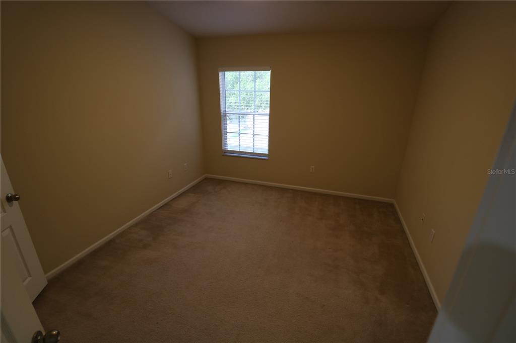 4866 Pond Ridge Drive Riverview, FL 33578 - Photo 32 of 38 an empty room with a window