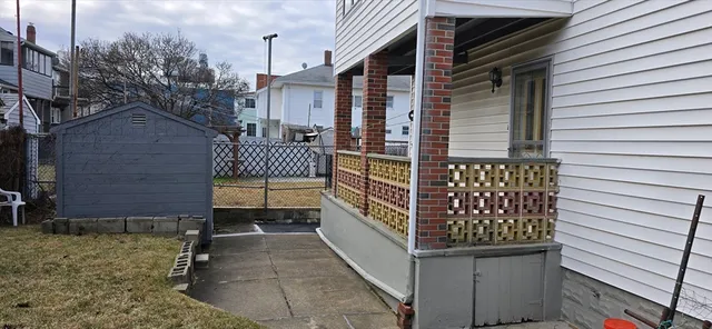 a view of entryway with wooden stairs