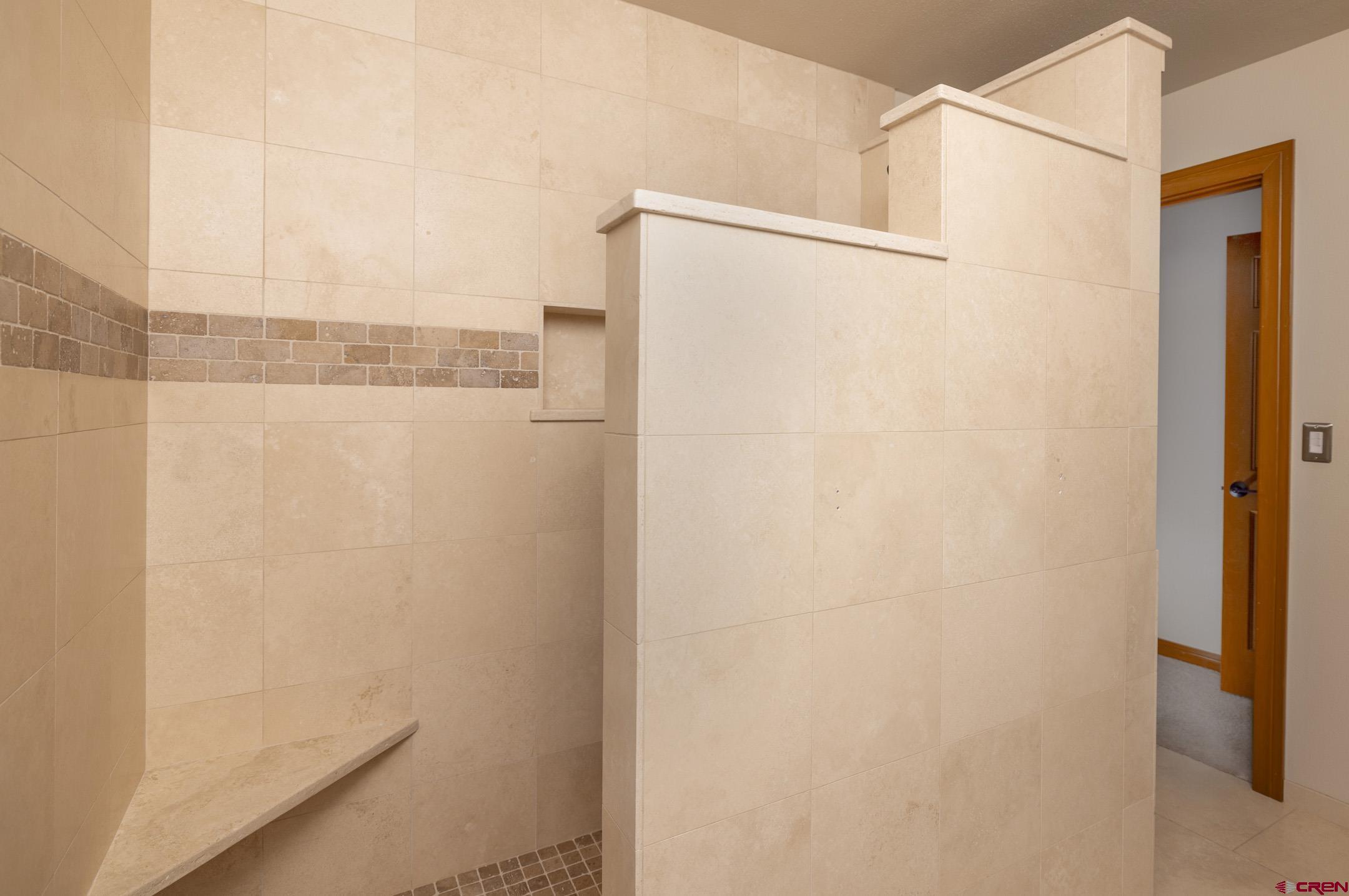 154 Falcon Ridge Road Durango, CO 81301 - Photo 25 of 42 a bathroom with a shower