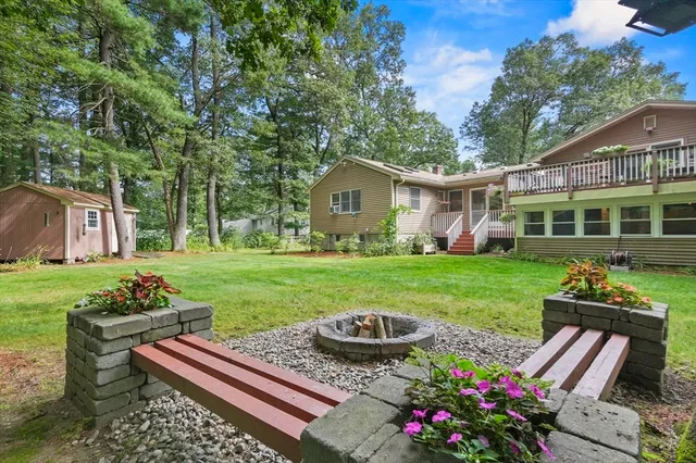a house with trees in the background