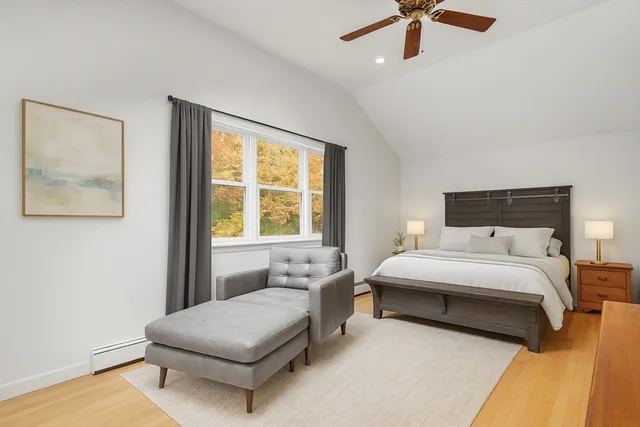 a view of a backyard with a garden and trees