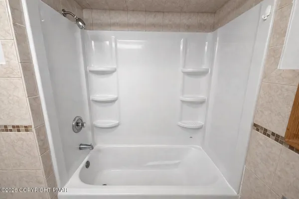 a bathroom with a tub