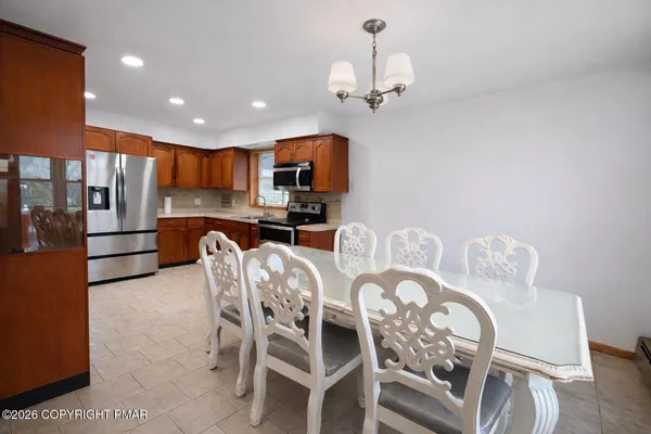 a view of a dining room with furniture