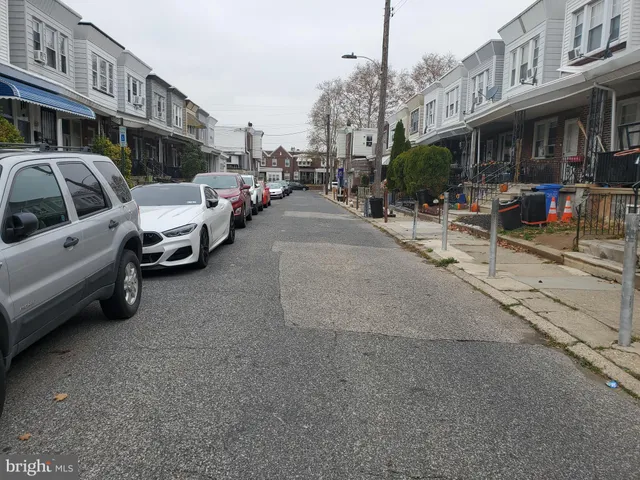 a view of a street with cars
